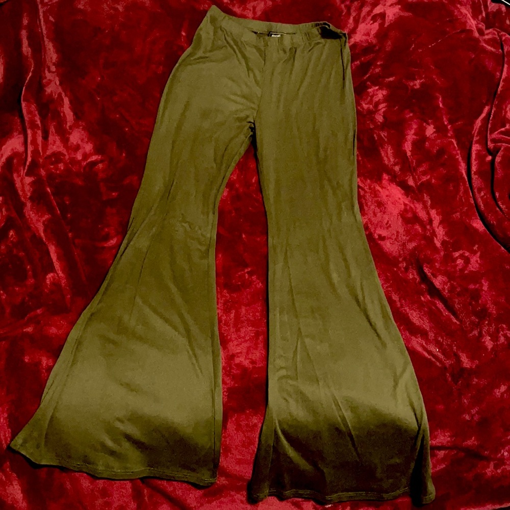 Green flared out pants.